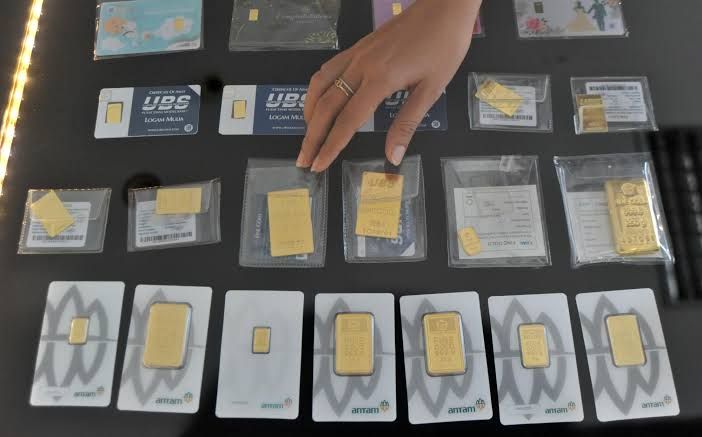 Harga Emas Stabil Menjelang Akhir Pekan